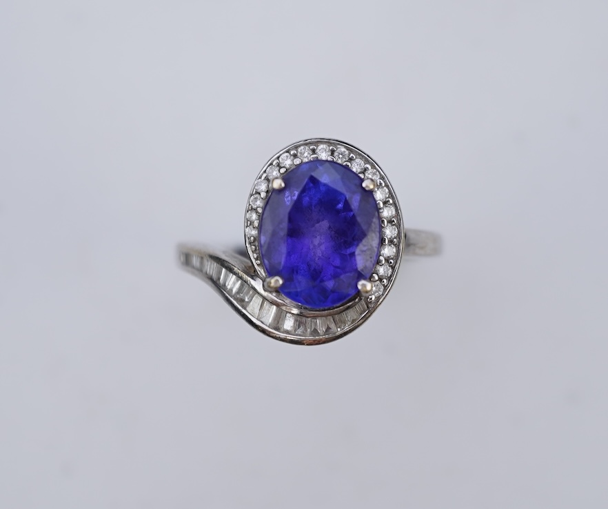A tanzanite and diamond ring